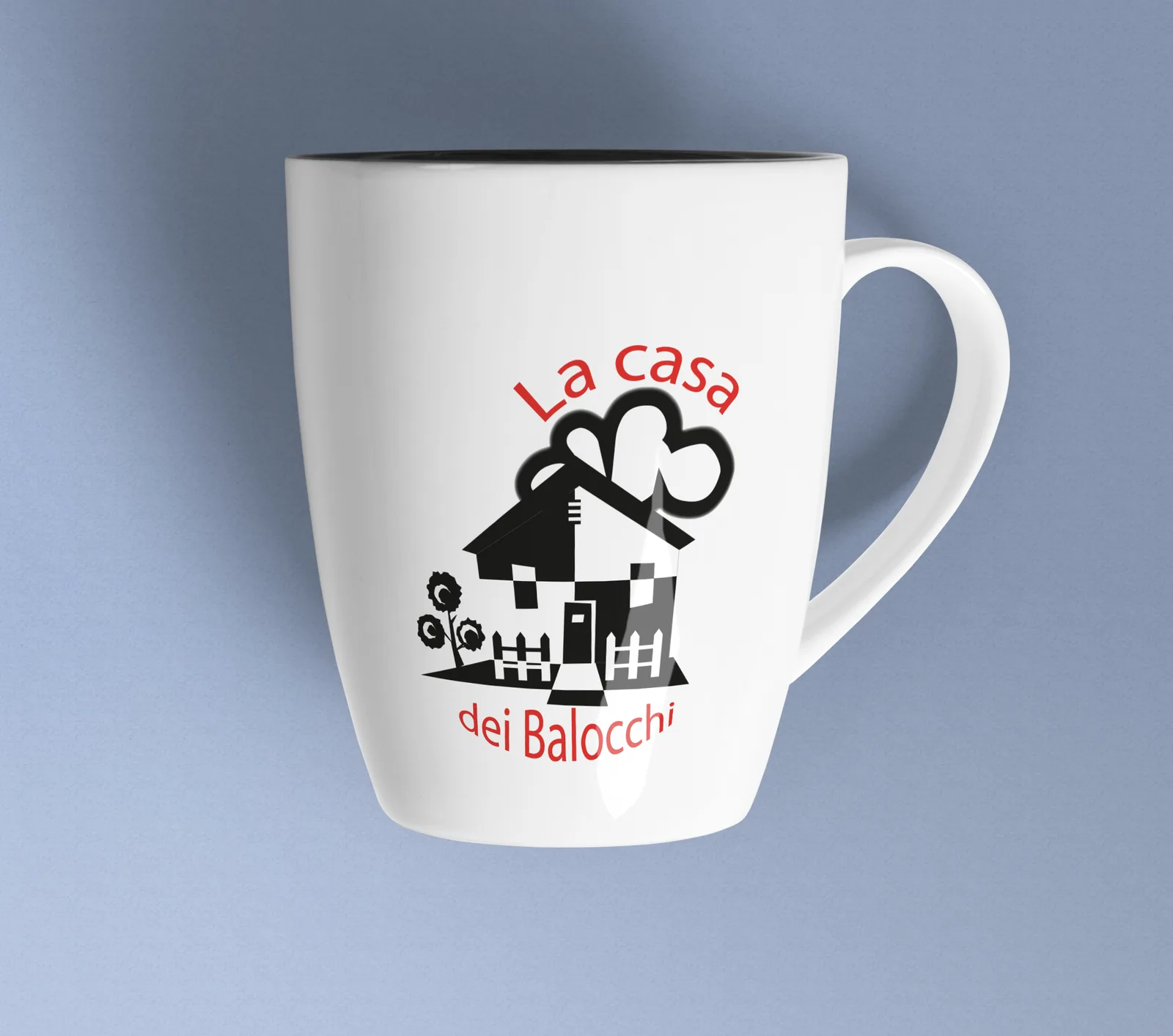 Mockup della tazza con il marchio La Casa dei Balocchi