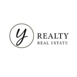 Ylenia Fotzi: il logotipo YRealty, la Y corsiva dentro un cerchio sottile